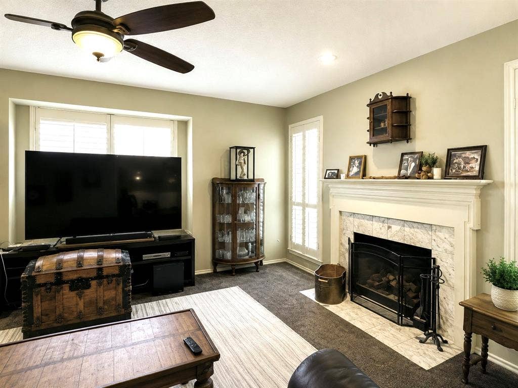 1221 Big Bend Drive, McKinney, TX 75069 View of the woodburning fireplace in the den