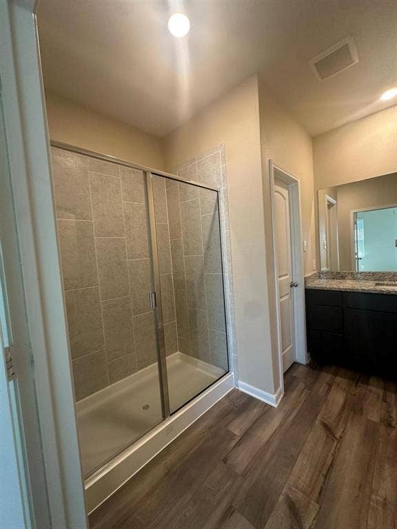 1707 Cotton Blossom Lane, Princeton, TX 75407 Walk-in shower with clear glass enclosure and tile surround