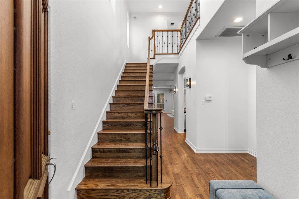 5639 Ellsworth Avenue, Dallas, TX 75206 Brand new hardwood floors and stained railing on stairs and 2nd floor