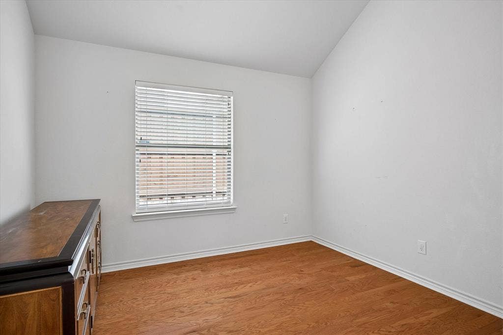 4601 Palm Valley Drive, Plano, TX 75024 Guest bedroom without virtual staging