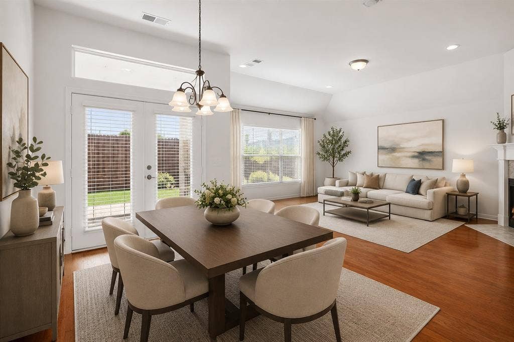 4601 Palm Valley Drive, Plano, TX 75024 Virtual view of staged breakfast area & den with fireplace!