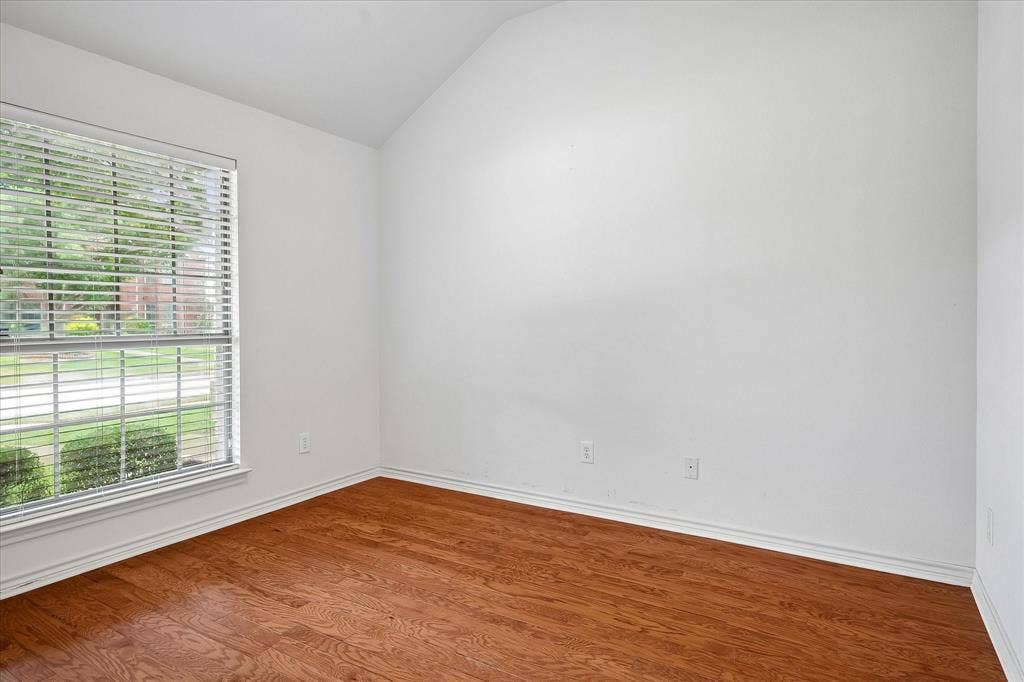 4601 Palm Valley Drive, Plano, TX 75024 Guest bedroom without virtual staging