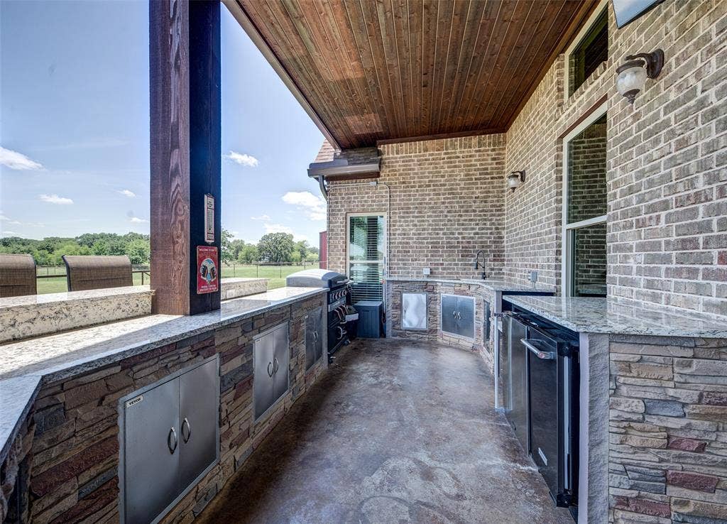 245 Fm 407 W, Argyle, TX 76226 View of outdoor kitchen on patio / terrace