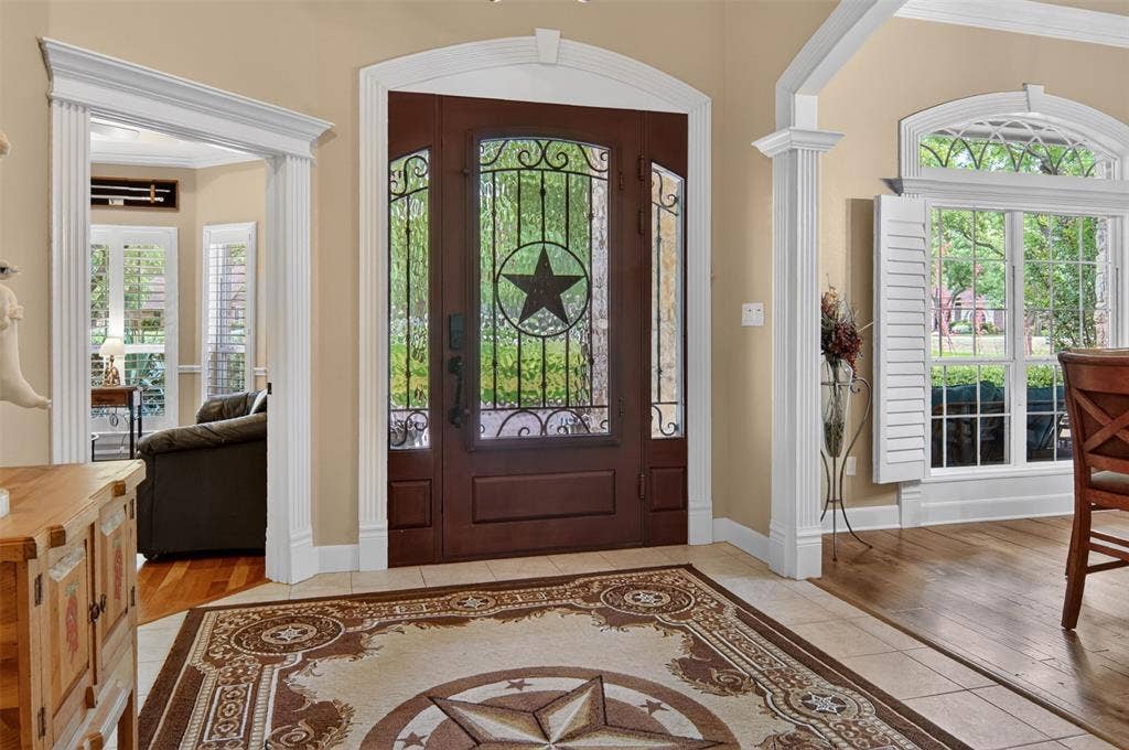 Entry hall with beautiful front door.