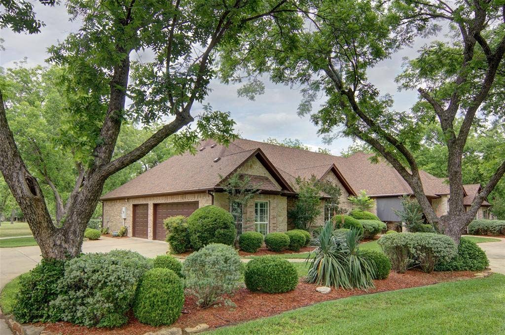 Beautiful trees and landscaping makes this home even more inviting!