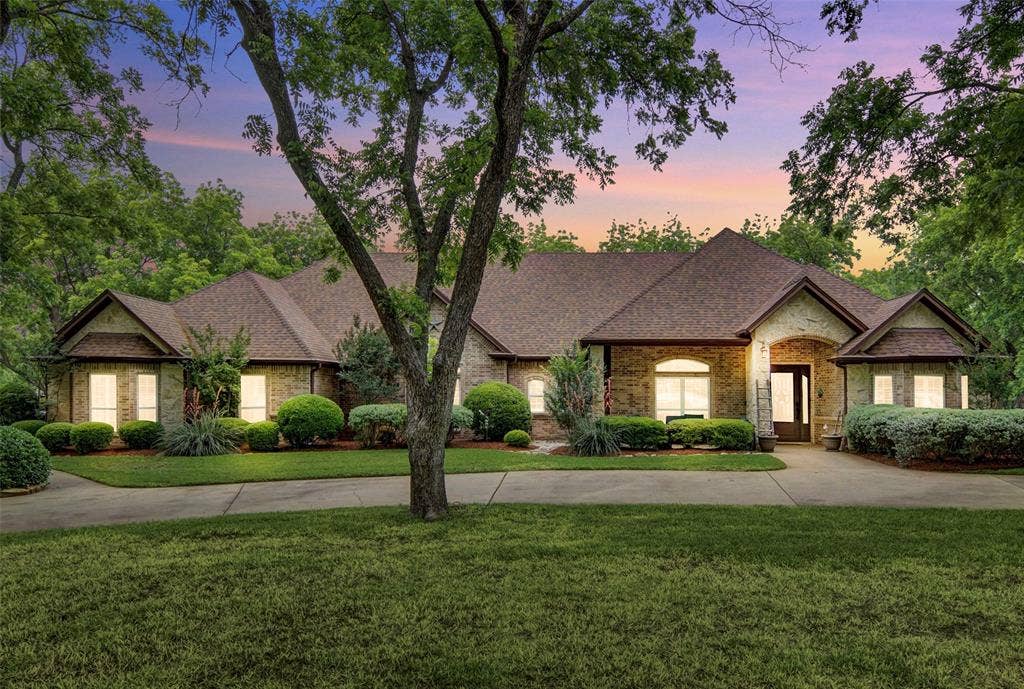 Beautiful sunset view of this lovely home.