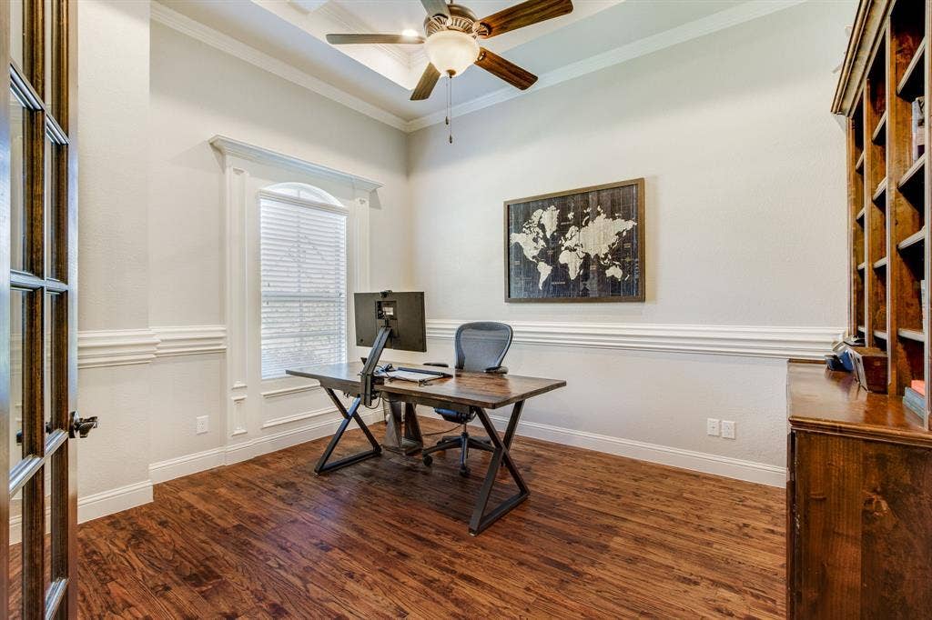 Oversized Study with French Doors & Built in Cabinetry at the Front Entry away from the busy household!