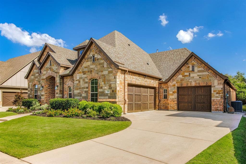 3 Car split garage is connected inside, extended driveway for guest parking!