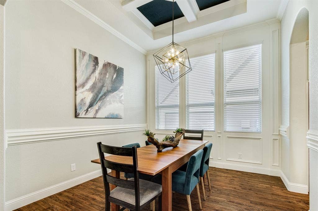 Spacious Dining space, bright natural light &  modern lighting.