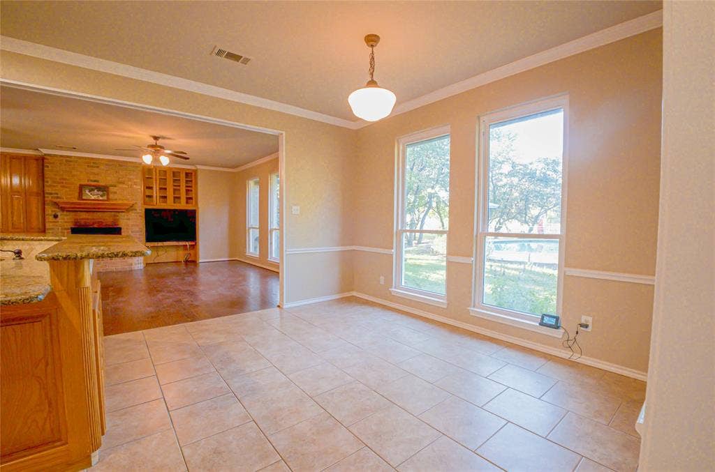 182 Lakeview Drive, Aledo, TX 76008 dining room overlooking pool & back yard.