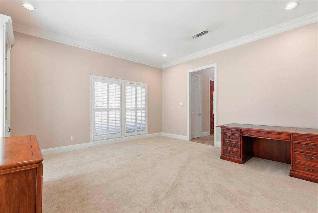 5949 River Bend Drive, Benbrook, TX 76132 Carpeted flooring, recessed lighting, crown molding, white window shutters, and painted walls