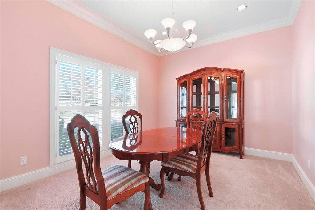5949 River Bend Drive, Benbrook, TX 76132 Recessed ceiling lighting, crown molding, white window shutters, and a chandelier with frosted glass shades