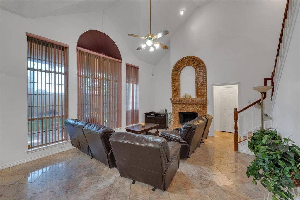 4622 Devonshire Drive, Grand Prairie, TX 75052 Living area featuring a vaulted ceiling and tile flooring