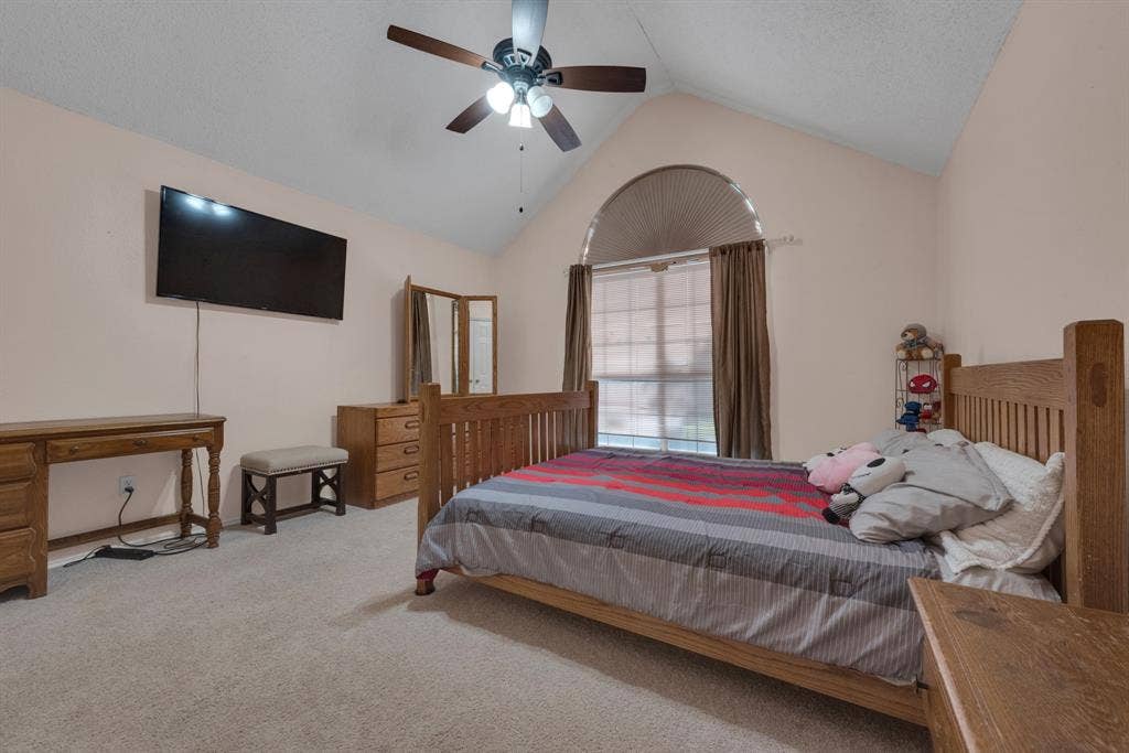 4622 Devonshire Drive, Grand Prairie, TX 75052 Vaulted ceiling with ceiling fan and light fixture