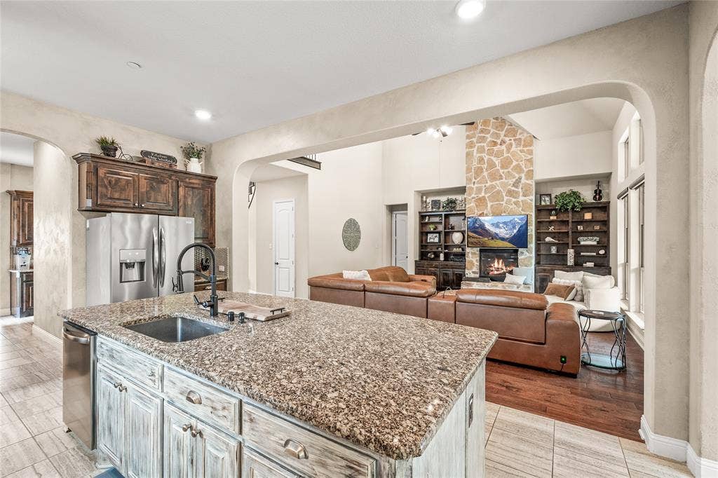 1615 Sara Cove, Lucas, TX 75002 Open concept kitchen and living area with large kitchen island