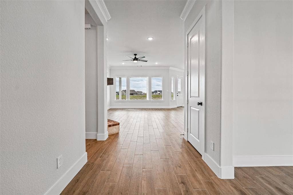 12413 Hornfels Drive, Krum, TX 76249 Wood-finish plank flooring throughout