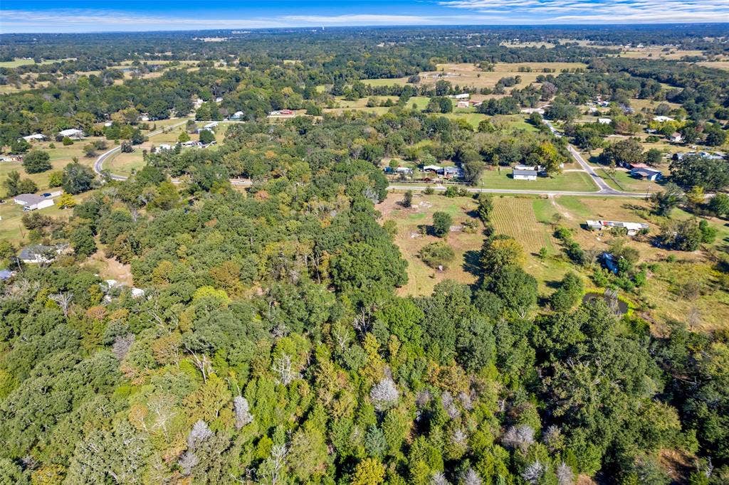 11691 Betty Lane, Kaufman, TX 75142 Expansive undeveloped land featuring mature trees and a varied topography