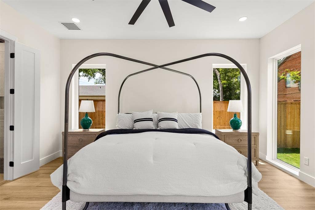 1407 Pueblo Street, Dallas, TX 75212 Spacious room featuring wood-finish flooring, recessed lighting, and a contemporary ceiling fan