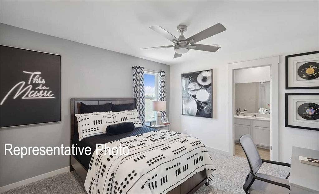Bedroom featuring carpet flooring and a ceiling fan