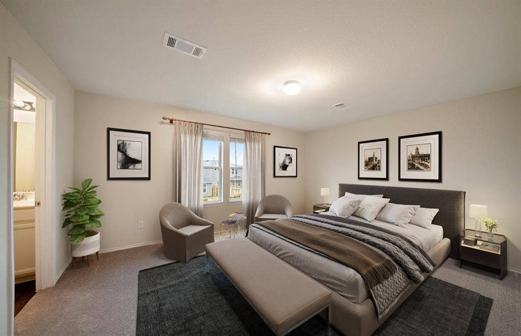 *Model Representation - Spacious owner's suite with private bath