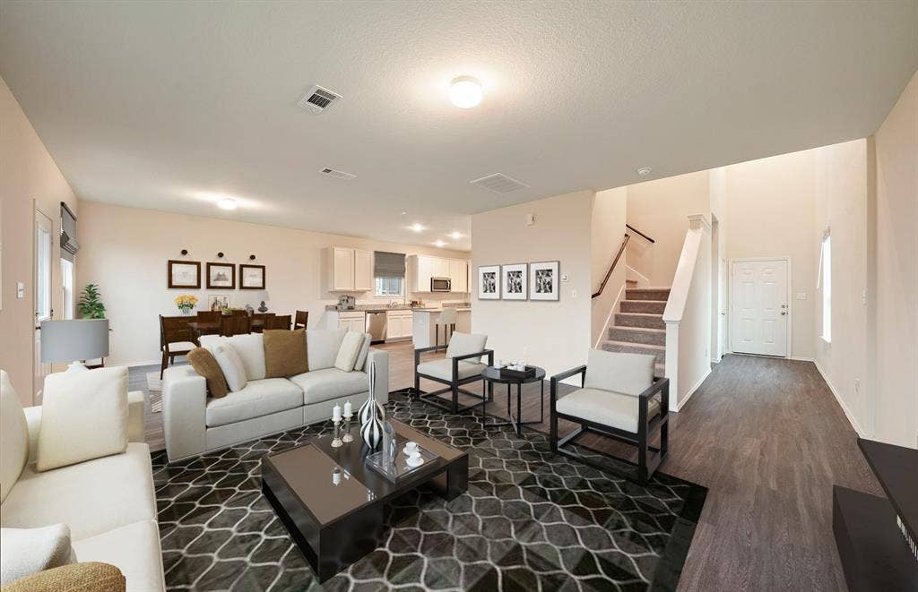 *Model Representation - Gathering room with view of main living areas
