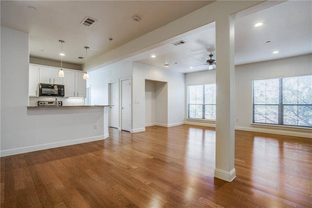 6159 Oram Street, #302, Dallas, TX 75214 Open floorplan with gleaming hardwood floors.