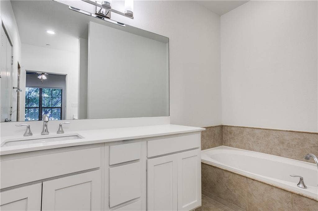 6159 Oram Street, #302, Dallas, TX 75214 Updated fixtures and large soaking tub complete the master bath