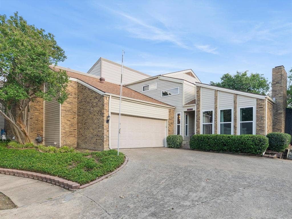 2812 Prescott Drive, Carrollton, TX 75006 Contemporary architecture featuring brick and siding facade