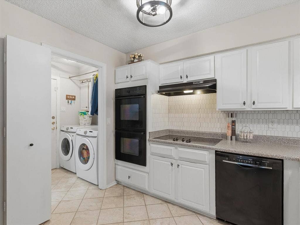 2812 Prescott Drive, Carrollton, TX 75006 Modern kitchen featuring white cabinetry, a built-in double oven, and a cooktop