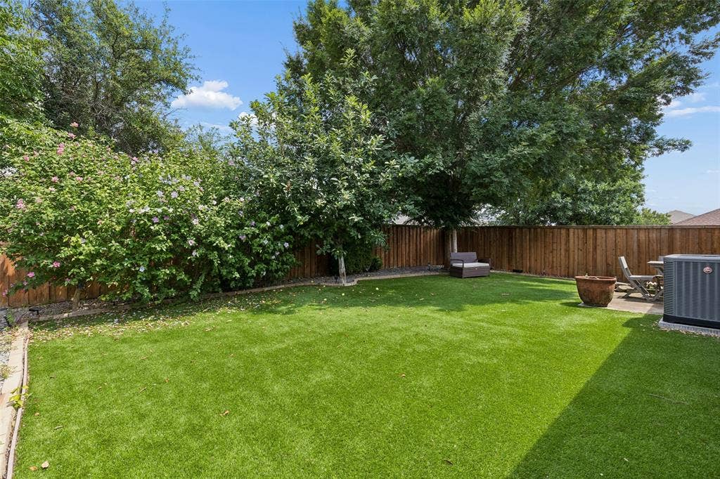 13166 Michelle Drive, Frisco, TX 75035 Retreat to your quiet yard with tons of space for pets and play.