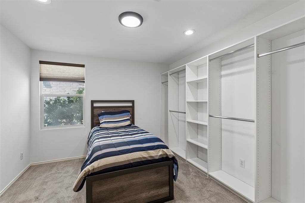 13166 Michelle Drive, Frisco, TX 75035 Secondary bedroom with built in shelving