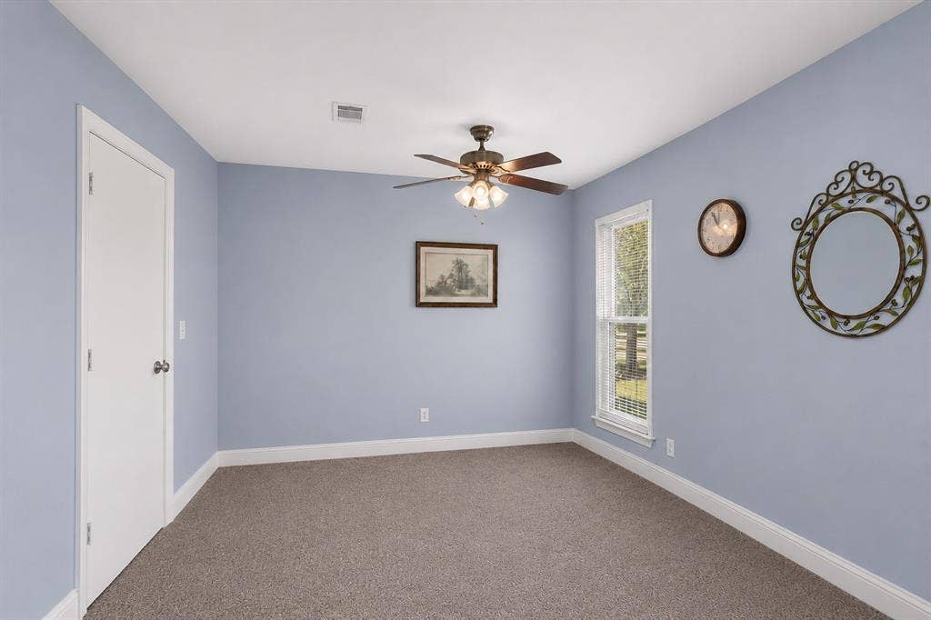 6200 Lalagray Lane, Watauga, TX 76148 Virtually altered photo illustrating a potential floor plan modification with the entry area enclosed by an additional wall. This image is for visualization purposes only.