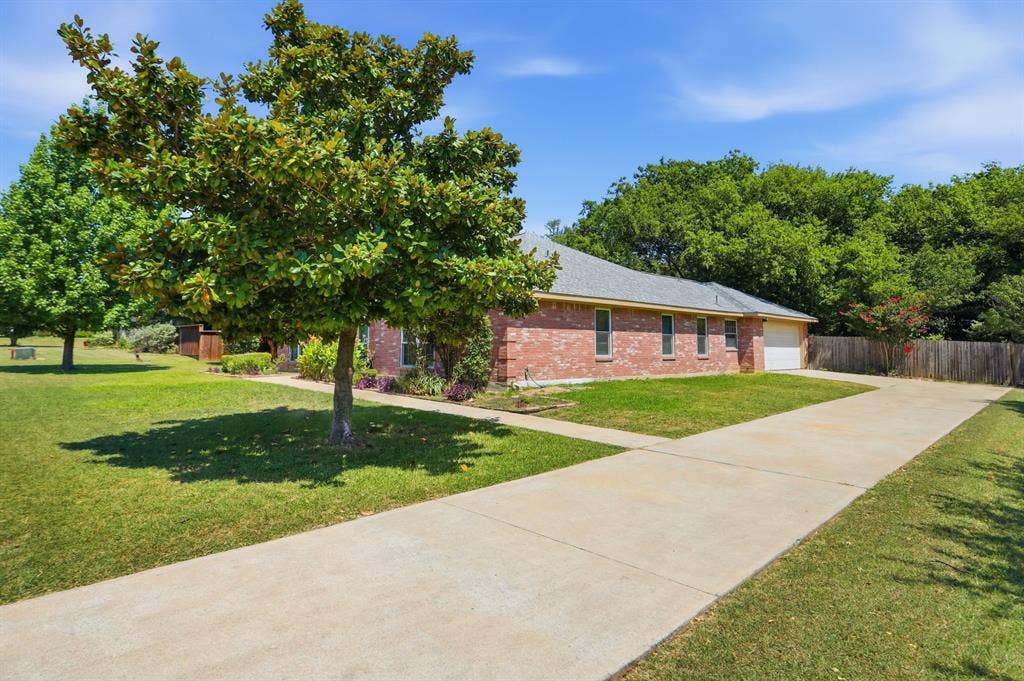 long driveway into garage parking.