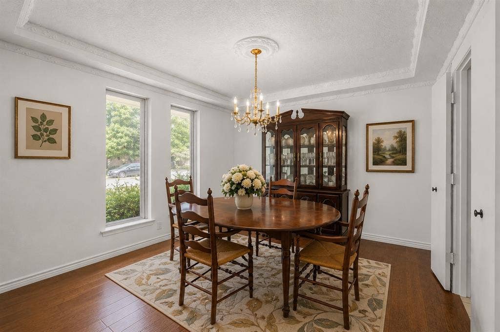 2125 Woodbrook Street, Denton, TX 76205 Formal dining space featuring wood-finish flooring and a decorative ceiling medallion
