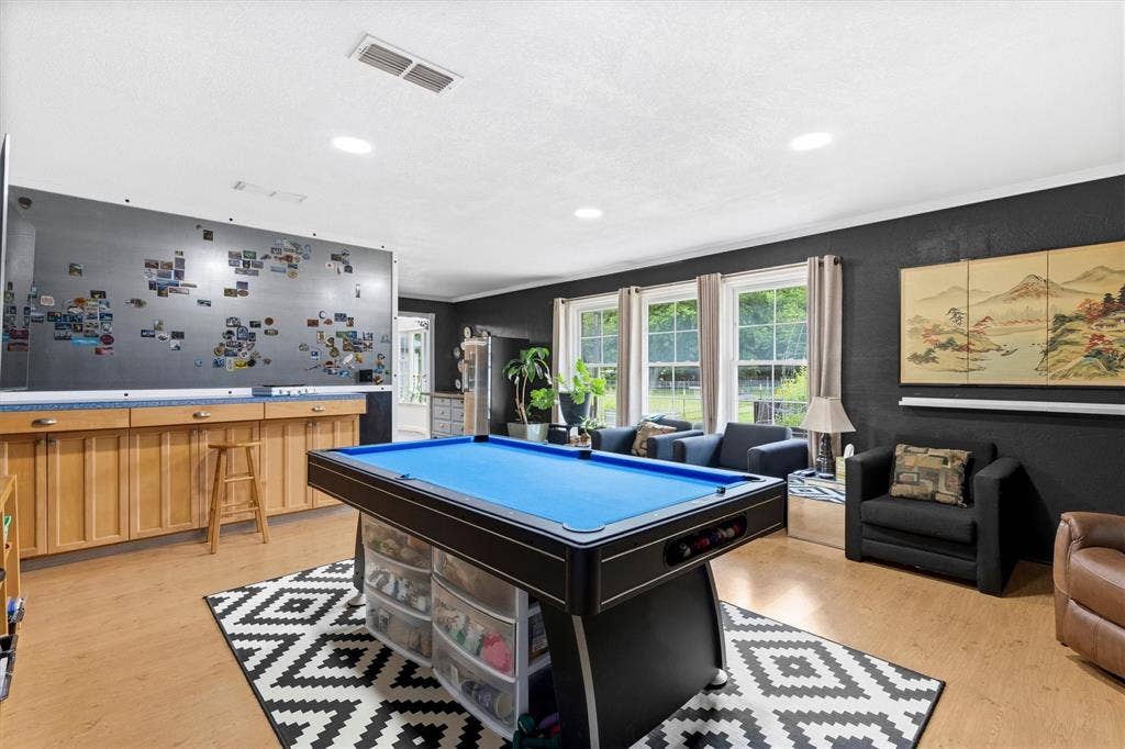 216 Meadowlark Lane, Wylie, TX 75098 Family Room with Built in Cabinet and storage.