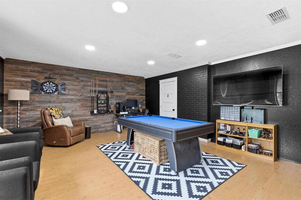216 Meadowlark Lane, Wylie, TX 75098 Family Room featuring Decorative Wall with Reclaimed Wood.