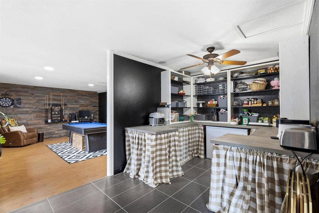 216 Meadowlark Lane, Wylie, TX 75098 Large Butlers Panty measures 17 x 9 feet and has room for extra frig and freezer. Along with shelving to store appliances and have space for entertaining.