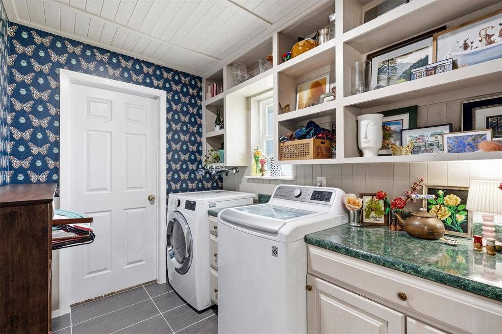 216 Meadowlark Lane, Wylie, TX 75098 Laundry Room with separate Storage Room attached. Built in Cabinets and Shelves.