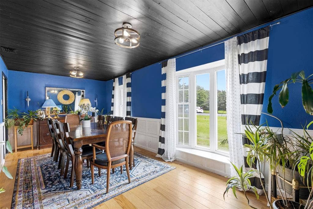 216 Meadowlark Lane, Wylie, TX 75098 Dining Area with wood floors and bay window.