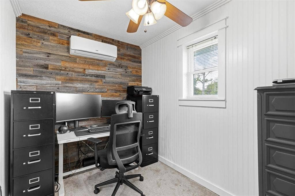 216 Meadowlark Lane, Wylie, TX 75098 Dedicated office space with reclaimed wood decorative wall.