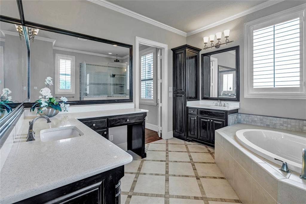 6412 Preferred Drive, Fort Worth, TX 76179 Double vanity with stone countertops and undermount sinks