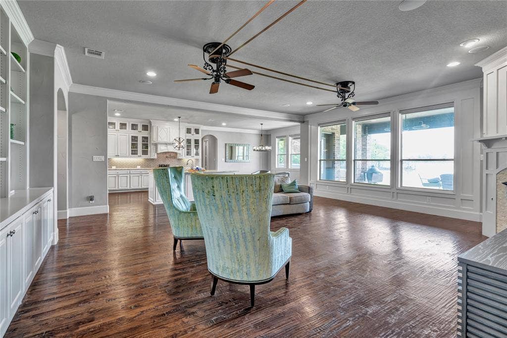 6412 Preferred Drive, Fort Worth, TX 76179 living room with an open vieww of the lake and beautiful sunsets.