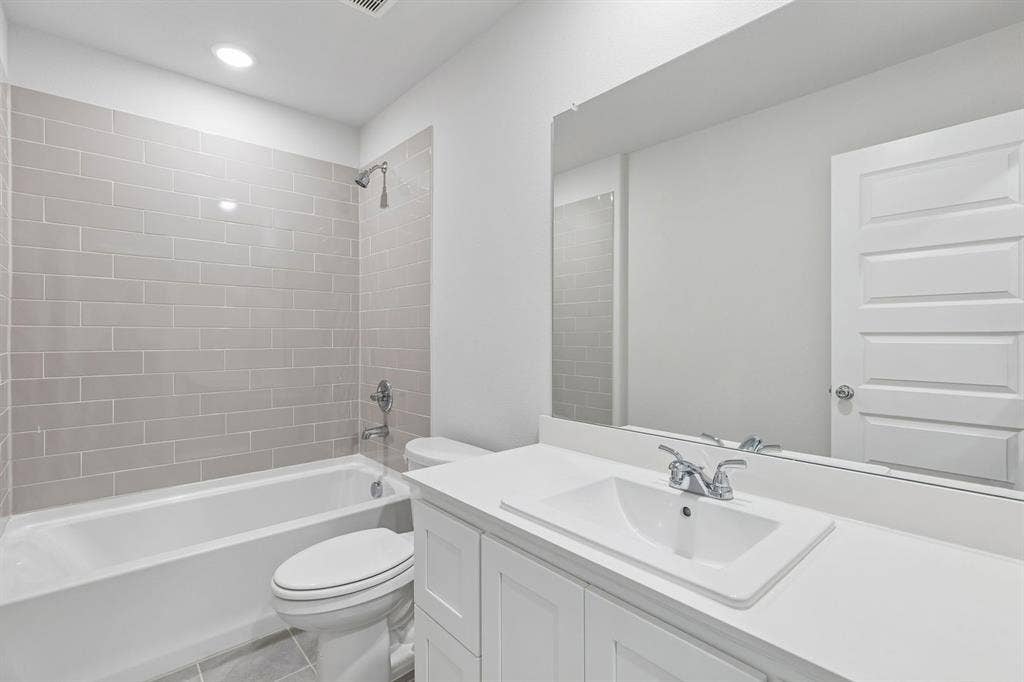4004 Somerville Drive, Farmersville, TX 75442 Bathroom in the Harrison home plan by Trophy Signature Homes – REPRESENTATIVE PHOTO