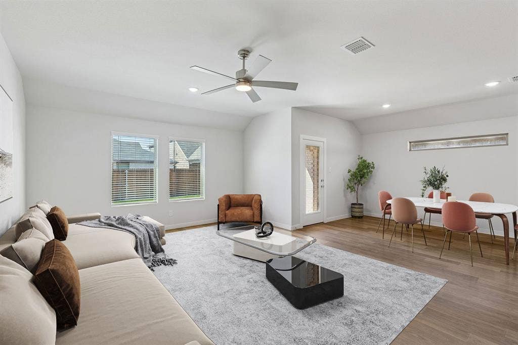 4004 Somerville Drive, Farmersville, TX 75442 Living Room in the Harrison home plan by Trophy Signature Homes – REPRESENTATIVE PHOTO