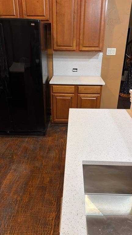 4506 Burnhill Drive, Plano, TX 75024 Wood-finish flooring, light-toned countertops, and wood cabinetry