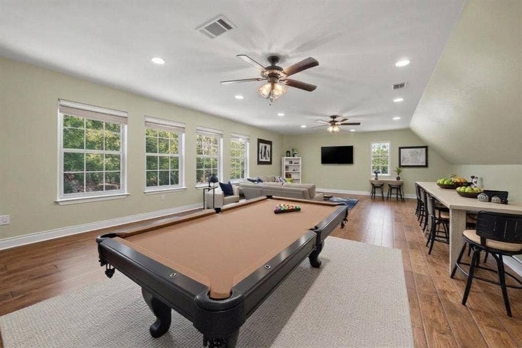 7811 Angelina Drive, Athens, TX 75752 upstairs game room featuring full bath. Could also be separate living quarters