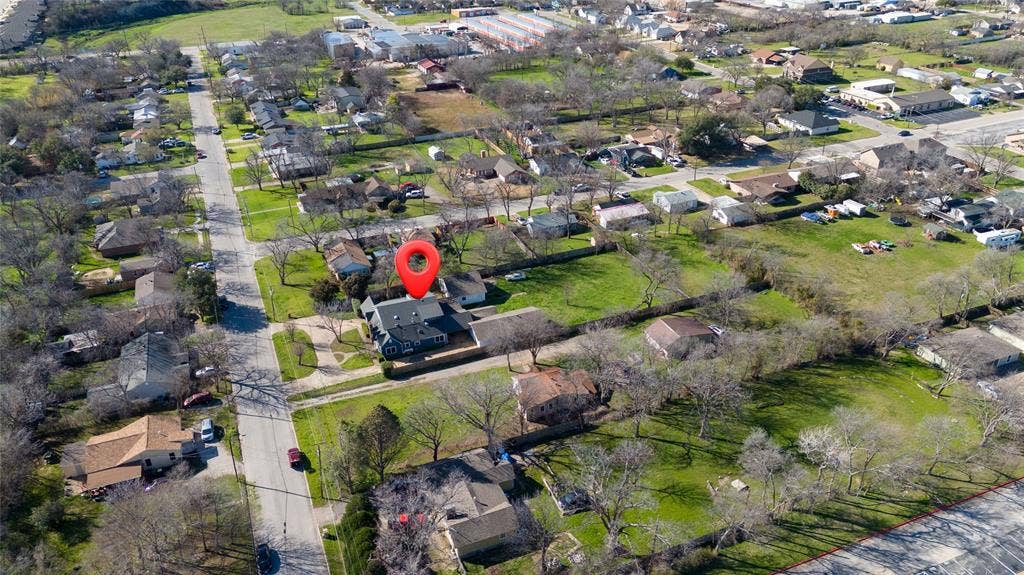 313 N Roe Street, White Settlement, TX 76108 Aerial view of a residential neighborhood with varied housing styles