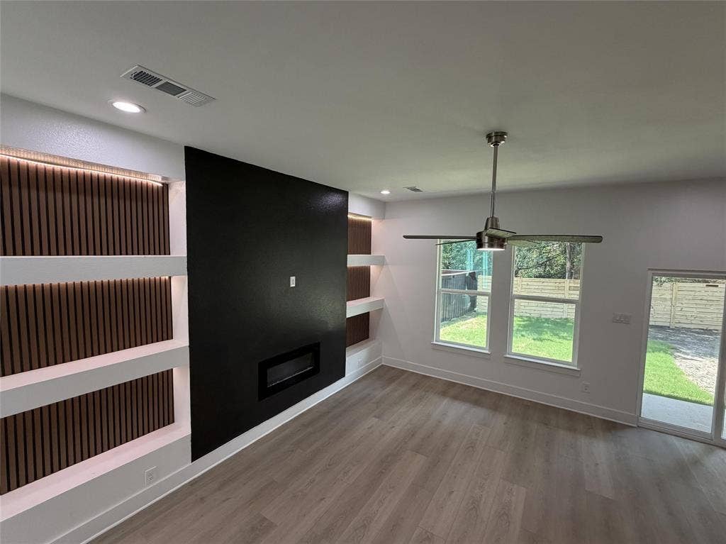 2823 Curvilinear Court, Dallas, TX 75227 Living room fireplace