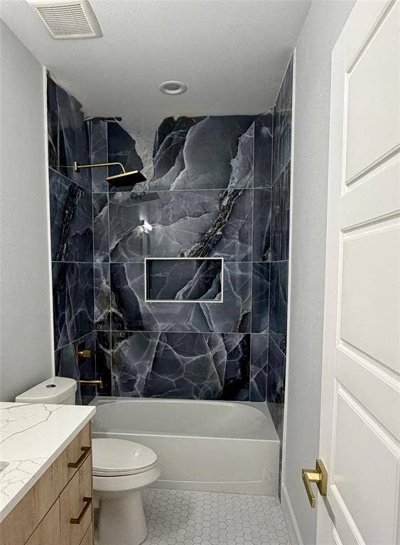 2823 Curvilinear Court, Dallas, TX 75227 Full tub/shower combination featuring striking dark veined tile surround with a recessed niche