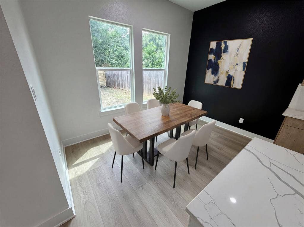 2823 Curvilinear Court, Dallas, TX 75227 Dining room has been virtually staged